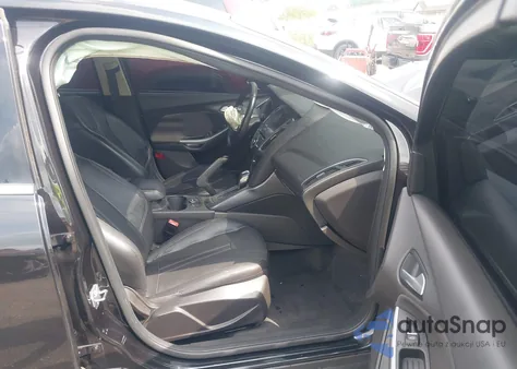 2012 Ford Focus Titanium z USA, uszkodzony, nr VIN 1FAHP3J24CL366021